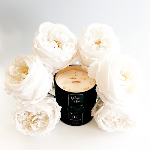 exquisite candle adorned with delicate flowers, ideal for home decor